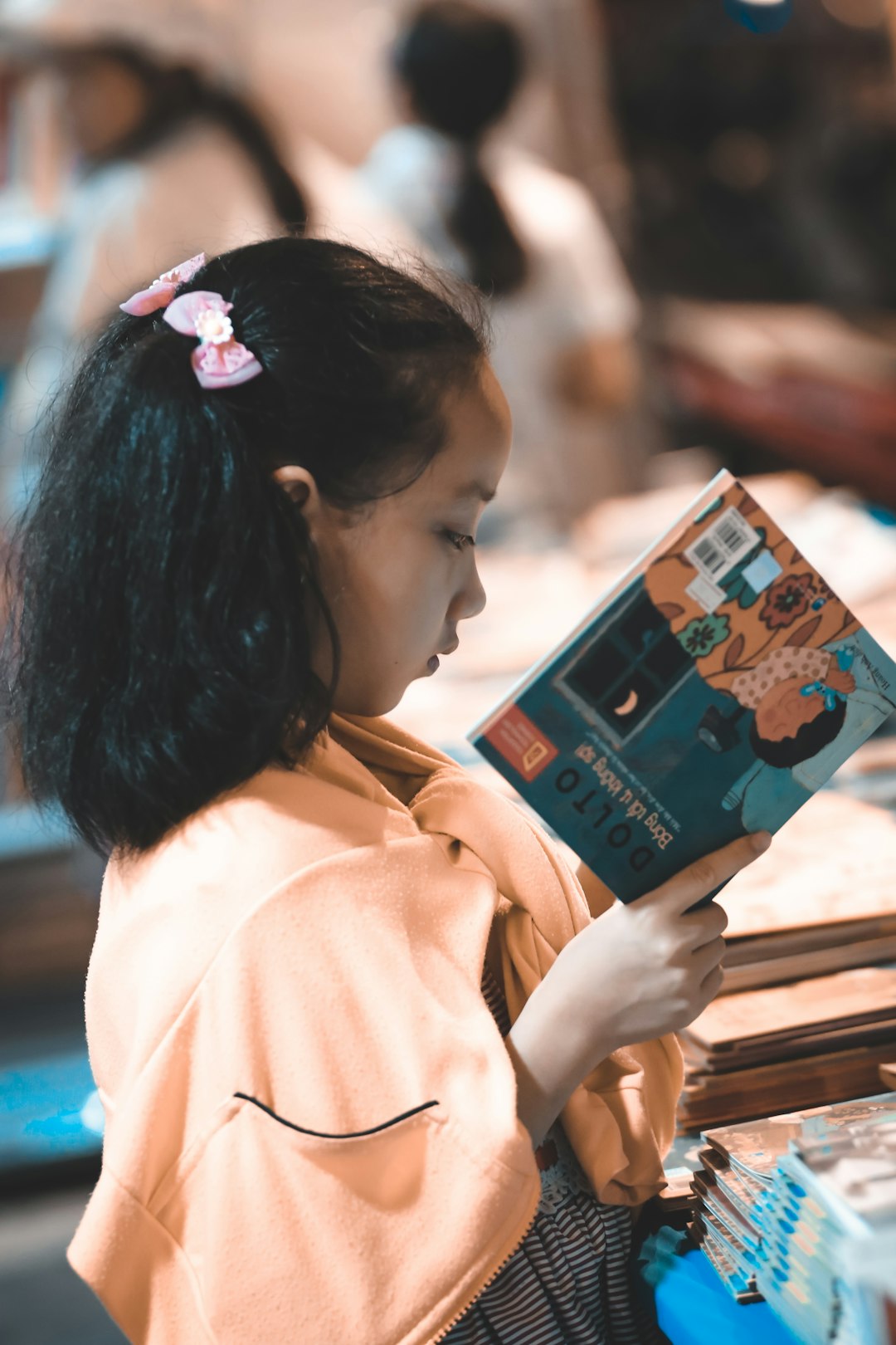 Young girl reading a book